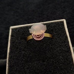 Ethiopian Welo Fire opal and set in gold anodized aluminum setting